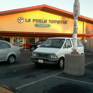 a white van parked in a parking lot