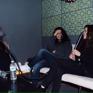 a group of people sitting on a couch