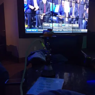 a television screen with a bunch of people on it