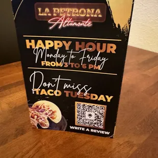 a happy hour sign