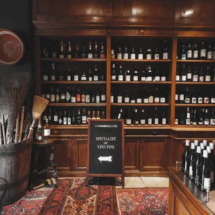Bustling wine shop, shelves packed with diverse selections for the discerning connoisseur.