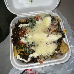 Asada nachos supreme