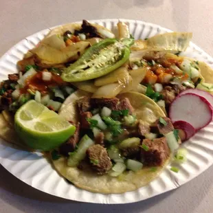 Asada, lengua, carnitas &amp; tripas tacos. Delicious
