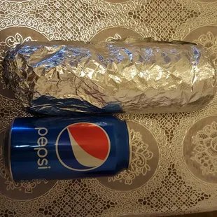 Super burrito..Using a 12oz Pepsi can to compare the size and only $5.