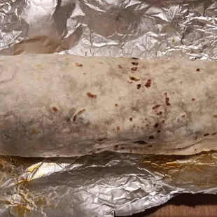 a burrito wrapped in foil