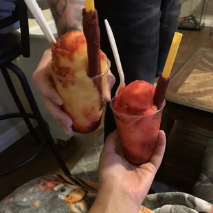 Mango and Watermelon Italian ice with chamoy and Lucas
