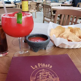 Chips and salad with Tito's and diet coke and strawberry margarita (too sweet)