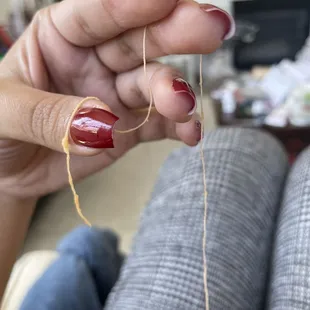 Long thread found baked within my food