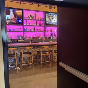 A corner of the bar exiting the ladies bathroom