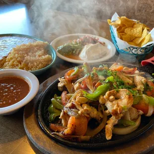 Chicken fajitas with all the trimmings and all the sizzle!