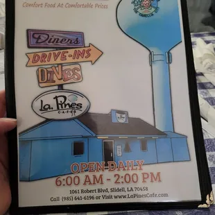 a hand holding a menu