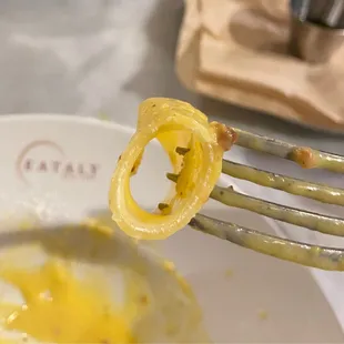 Rigatoni alla Carbonara, you can see the white inner ring where it is still hard and uncooked.