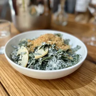 a bowl of spinach and cheese