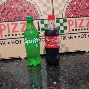 a bottle of soda and a bottle of soda