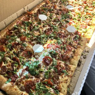 Mega pepperoni, sausage, bacon, and cilantro.