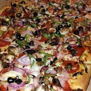Our half veggie and half combo mega pizza.