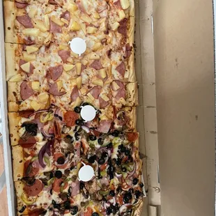 Mega pizza half Hawaiian and half supreme (36 slices)