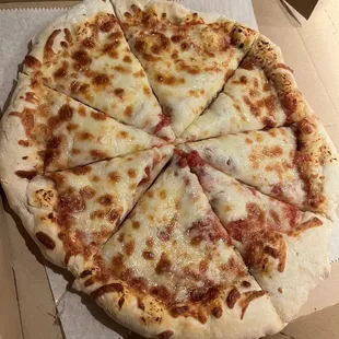 a pizza in a cardboard box