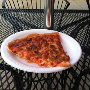Sausage pizza slice