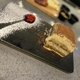 $10 TIRAMISU layered lady fingers dipped into coffee with mascarpone cheese