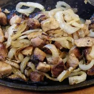 This is supposed to be carnitas plate looks more like onions with some meat here and there