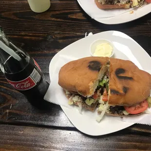 Torta de Carne Asada with a bottle of coke. Yum!!