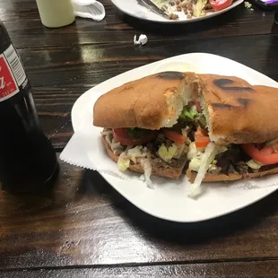 a sandwich and a coke
