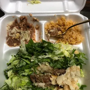 One bite of rice and beans gone. Not even 1/4 of a cup of rice and beans. Look at the tortilla. Waste of almost 20 dollars