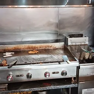 a man preparing food in a commercial kitchen