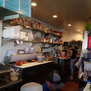 a man working in a restaurant kitchen