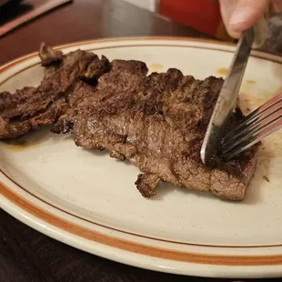 Carne Asada. (He didn't want the beans and rice, but he really enjoyed that steak.)
