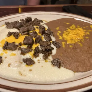 Fajita enchiladas with sour cream sauce