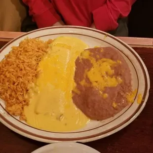 Kid's cheese enchilada with queso.