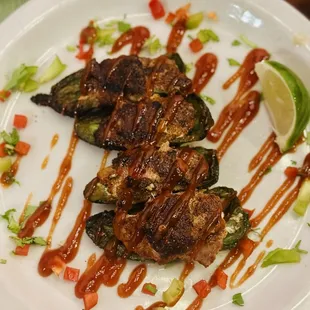 Quail poppers wrapped in bacon