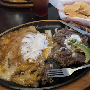 Steak and enchiladas.