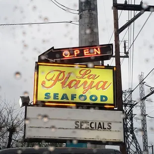 a neon sign for a restaurant