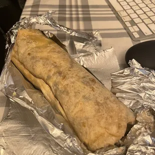 a burrito wrapped in foil