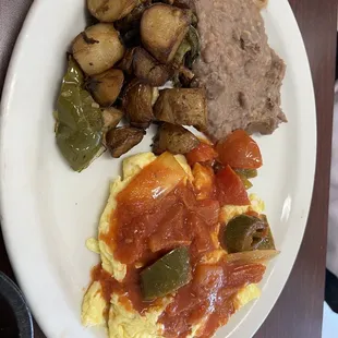 Huevos rancheros with beans &amp; potatoes