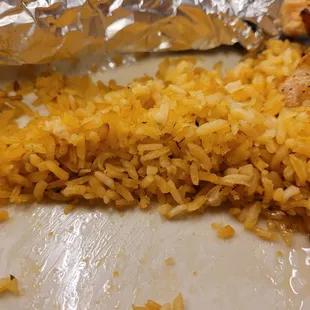 Rice was dry and chicken was so hard.