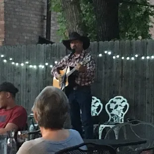 Relaxing dinner on the patio. Warm CO evening. Delicious food. Great country singer. Shared with special friends at LaPlaza Inn Walsenburg