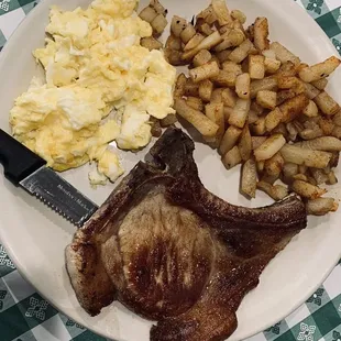 Pork chop, soft scrambled eggs &amp; potatoes