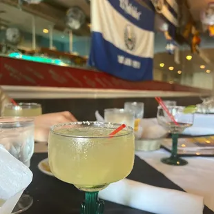 a margarita in a glass on a table