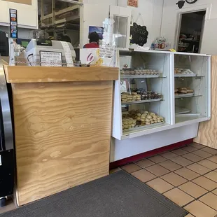a counter with a variety of pastries