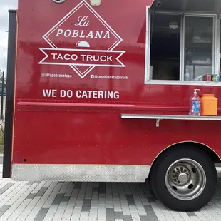 a taco truck parked on the side of the road