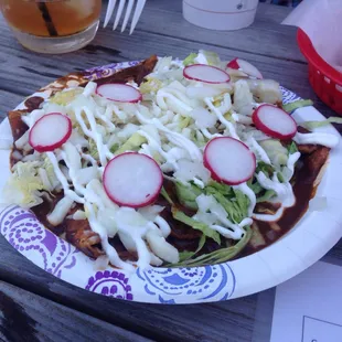 Chicken enchilada with mole sauce