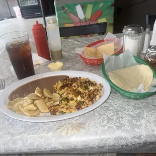 Huevos con Chorizo with some chopped jalepenos mixed in