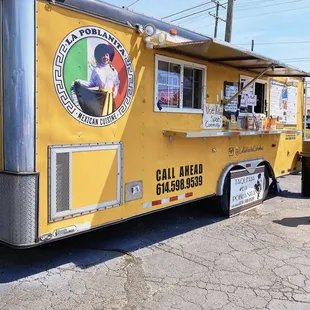 a yellow food truck