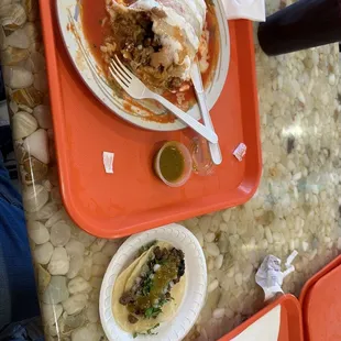 Burrito mojado de Al pastor and taco de asada