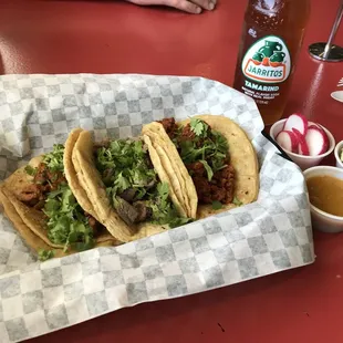 Everything was great. Chorizo, lengua, and al pastor tacos shown.