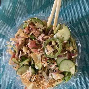 Brown rice, tuna, jalapeños, cilantro, red onion, zucchini, crab meat, sesame seeds, cucumbers drizzled with spicy and eel sauce